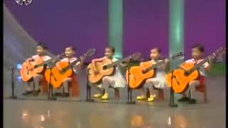 North Korea children playing the guitar