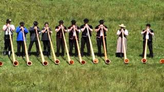 22 Alphorns Play in Switzerland